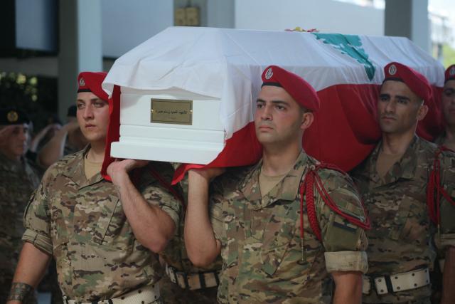 Lebanese army soldiers carry the coffin of Brigadier General Wissam Sabra, who was killed in an Israeli strike, during his funeral in Beirut on June 7, 2026. An Israeli strike in southern Lebanon killed three soldiers, Beirut's military said on June 6, as its chief travelled to Pakistan to meet with a key mediator in efforts to end the Middle East war. (Photo by ibrahim AMRO / AFP)