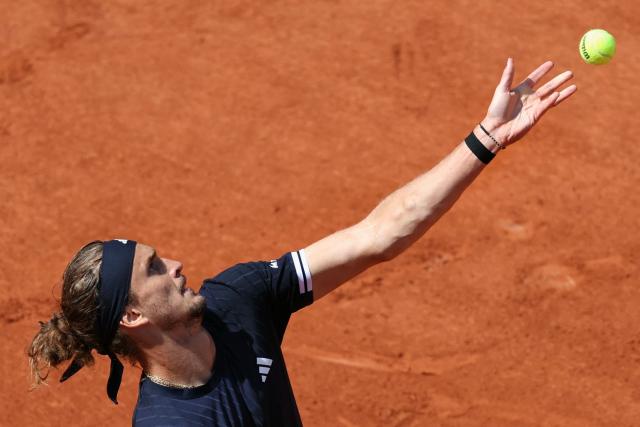 Germany's Alexander Zverev serves to Italy's Flavio Cobolli during their men's final singles match on day 15 of the French Open tennis tournament on Court Philippe-Chatrier at the Roland-Garros Complex in Paris on June 7, 2026. (Photo by Alain JOCARD / AFP)