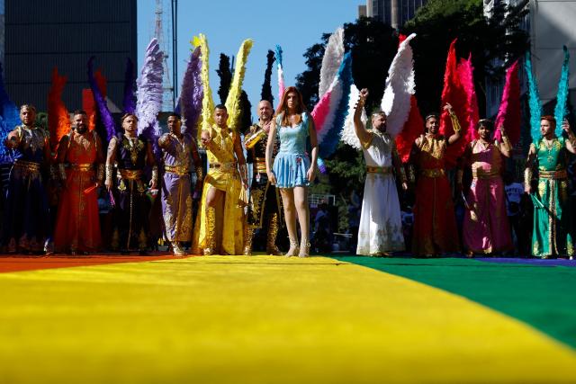 Revellers take part in the 30th LGBT Pride Parade in Sao Paulo, Brazil, on June 7, 2026. (Photo by Miguel SCHINCARIOL / AFP)