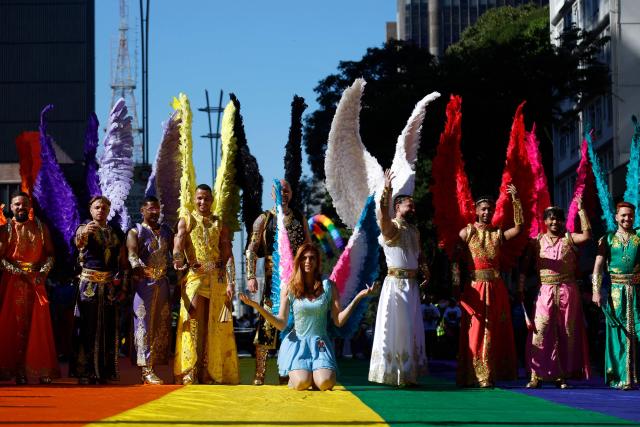 TOPSHOT - Revellers take part in the 30th LGBT Pride Parade in Sao Paulo, Brazil, on June 7, 2026. (Photo by Miguel SCHINCARIOL / AFP)