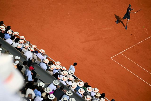 Germany's Alexander Zverev plays a forehand return to Italy's Flavio Cobolli during their men's final singles match on day 15 of the French Open tennis tournament on Court Philippe-Chatrier at the Roland-Garros Complex in Paris on June 7, 2026. (Photo by JULIEN DE ROSA / AFP)