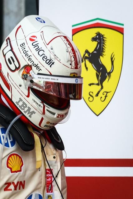Ferrari's Monegasque driver Charles Leclerc reacts after coming back to the pit after crashing and withdrawing from the race during Monaco Formula 1 Grand Prix at the Monaco street circuit in Monaco, ahead of the, on June 7, 2026. (Photo by Yves Herman / POOL / AFP)