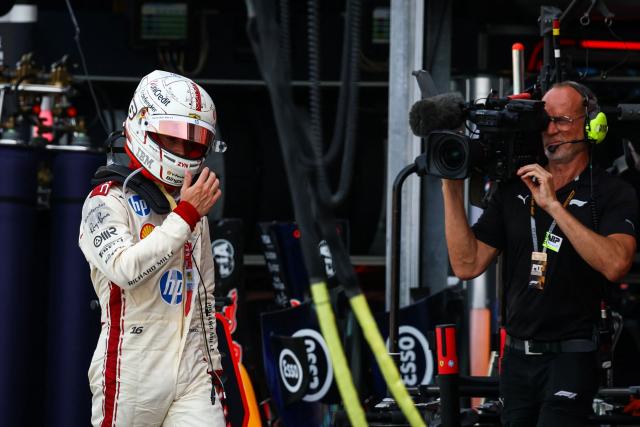 Ferrari's Monegasque driver Charles Leclerc reacts after coming back to the pit after crashing and withdrawing from the race during Monaco Formula 1 Grand Prix at the Monaco street circuit in Monaco, ahead of the, on June 7, 2026. (Photo by Yves Herman / POOL / AFP)