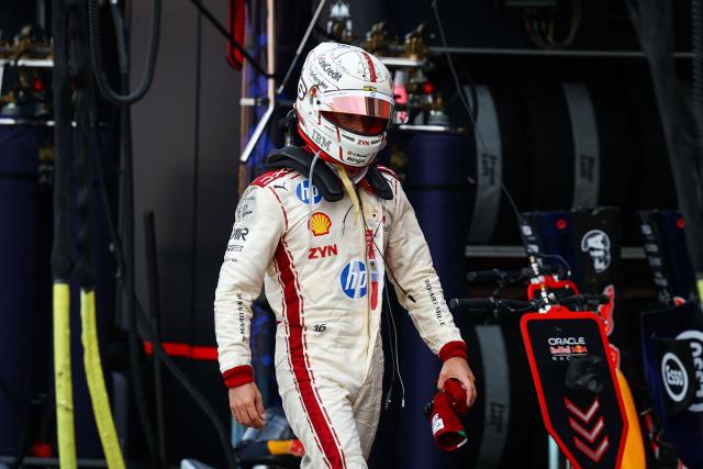 Ferrari's Monegasque driver Charles Leclerc reacts after coming back to the pit after crashing and withdrawing from the race during Monaco Formula 1 Grand Prix at the Monaco street circuit in Monaco, ahead of the, on June 7, 2026. (Photo by Yves Herman / POOL / AFP)