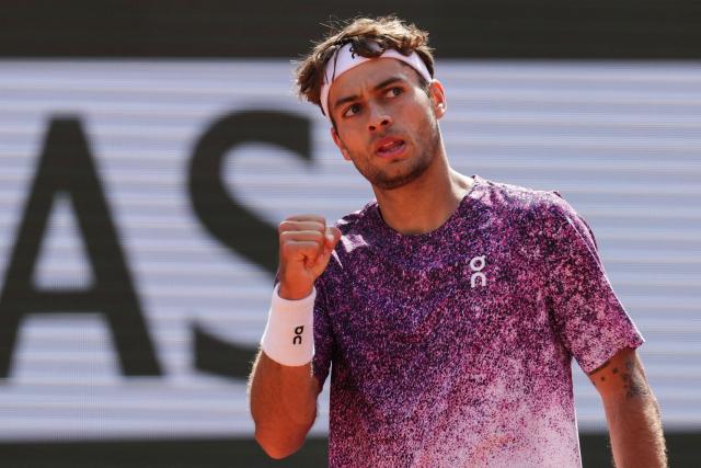 Italy's Flavio Cobolli reacts after a point as he plays against during his mens final singles match against Germany's Alexander Zverev on day 15 of the French Open tennis tournament on Court Philippe-Chatrier at the Roland-Garros Complex in Paris on June 7, 2026. (Photo by Dimitar DILKOFF / AFP)