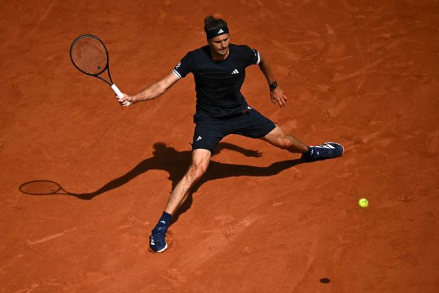Germany's Alexander Zverev plays a forehand return to Italy's Flavio Cobolli during their men's final singles match on day 15 of the French Open tennis tournament on Court Philippe-Chatrier at the Roland-Garros Complex in Paris on June 7, 2026. (Photo by JULIEN DE ROSA / AFP)