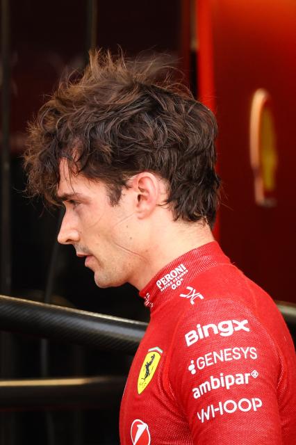Ferrari's Monegasque driver Charles Leclerc reacts after coming back to the pit after crashing and withdrawing from the race during Monaco Formula 1 Grand Prix at the Monaco street circuit in Monaco, ahead of the, on June 7, 2026. (Photo by Yves Herman / POOL / AFP)