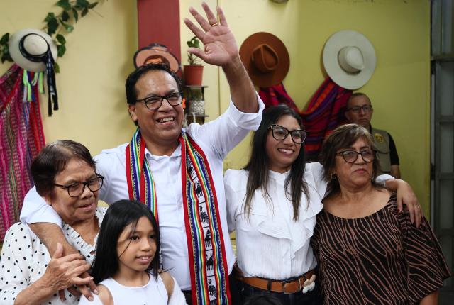 Peru's presidential candidate Roberto Sanchez, for the Juntos por el Peru party, poses with his wife Claudia Pinazzo (2nd R), their daughters Qorianka (R) and Killa (C), his mother (L) and mother-in-law during an election-day breakfast in Huaral, Lima department, Peru on June 7, 2026. Peruvians will choose their ninth president in 10 years in a tight runoff election between conservative Keiko Fujimori and leftist Roberto Sanchez, who are trying to woo voters fed up with political chaos and rising crime. (Photo by Connie FRANCE / AFP)