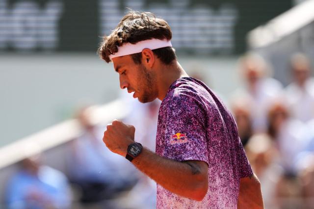 Italy's Flavio Cobolli reacts after a point as he plays against during his mens final singles match against Germany's Alexander Zverev on day 15 of the French Open tennis tournament on Court Philippe-Chatrier at the Roland-Garros Complex in Paris on June 7, 2026. (Photo by Dimitar DILKOFF / AFP)