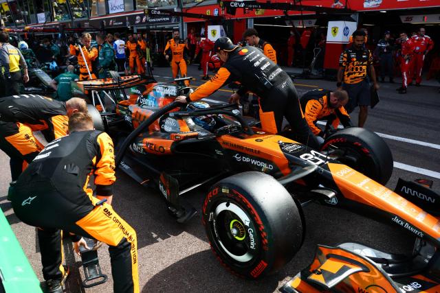 McLaren's Australian driver Oscar Piastri makes a pit stop as part of a break in the race during Monaco Formula 1 Grand Prix at the Monaco street circuit in Monaco, ahead of the, on June 7, 2026. (Photo by Yves Herman / POOL / AFP)