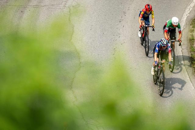 UAE Italian rider Elisa Longo Borghini (C), Lidl Trek Canadian rider Isabella Holmgren (L) and Canyon SRAM German rider Antonia Niedermaier ride in the breakaway during the 9th stage of the Giro d'Italia Women 2026 - Tour of Italy Women cycling race between Saluzzo and Saluzzo, Italy, on June 7, 2026. (Photo by MARCO BERTORELLO / AFP)