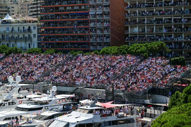 Members of the public watch the Monaco Formula 1 Grand Prix at the Monaco street circuit in Monaco, ahead of the, on June 7, 2026. (Photo by Andrej ISAKOVIC / AFP)