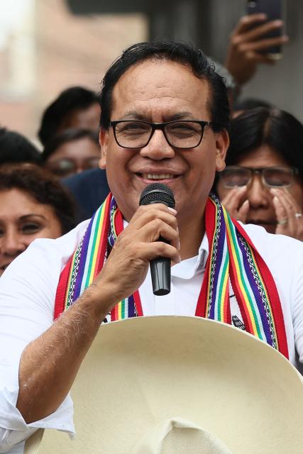 Peru's presidential candidate Roberto Sanchez, for the Juntos por el Peru party, speaks to the media after an election-day breakfast in Huaral, Lima department, Peru on June 7, 2026. Peruvians will choose their ninth president in 10 years in a tight runoff election between conservative Keiko Fujimori and leftist Roberto Sanchez, who are trying to woo voters fed up with political chaos and rising crime. (Photo by Connie FRANCE / AFP)