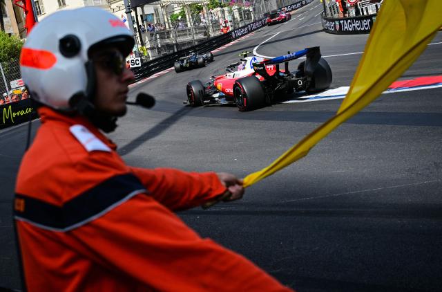 Mercedes' Italian driver Kimi Antonelli (C) and Ferrari's British driver Lewis Hamilton (R) follow the safety car during Monaco Formula 1 Grand Prix at the Monaco street circuit in Monaco, ahead of the, on June 7, 2026. (Photo by Andrej ISAKOVIC / AFP)
