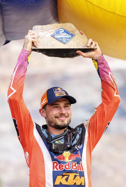 Second placed Canada's Trystan Hart celebrates on the podium after the Red Bull Hare Scramble motorbike competition event as part of the Erzbergrodeo on the Erzberg in Eisenerz, Austria on June 7, 2026. (Photo by ERWIN SCHERIAU / APA / AFP) / Austria OUT