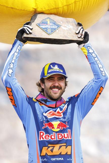 Germany's Manuel Lettenbichler celebrates after winning the Red Bull Hare Scramble motorbike competition event as part of the Erzbergrodeo on the Erzberg in Eisenerz, Austria on June 7, 2026. (Photo by ERWIN SCHERIAU / APA / AFP) / Austria OUT