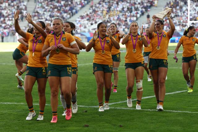 Australia's players celebrate at the end of the HSBC SVNS World Championship women's rugby union sevens final match between New Zealand and Australia at the Atlantique Bordeaux Metropole Stadium in Bordeaux, southwestern France, on June 7, 2026. (Photo by ROMAIN PERROCHEAU / AFP)