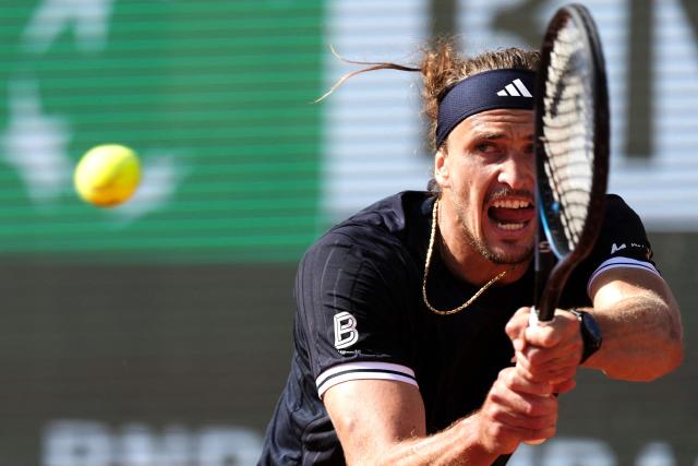 Germany's Alexander Zverev plays a backhand return to Italy's Flavio Cobolli during their mens final singles match on day 15 of the French Open tennis tournament on Court Philippe-Chatrier at the Roland-Garros Complex in Paris on June 7, 2026. (Photo by Dimitar DILKOFF / AFP)