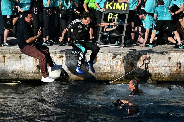 Winner Mercedes' Italian driver Kimi Antonelli jumps in the sea after winning the Monaco Formula 1 Grand Prix at the Monaco street circuit in Monaco, ahead of the, on June 7, 2026. (Photo by Gabriel BOUYS / AFP)