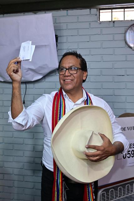 Peru's presidential candidate Roberto Sanchez, for the Juntos por el Peru party, prepares to cast his vote during the general election runoff, in Lima on June 7, 2026. Peruvians will choose their ninth president in 10 years in a tight runoff election between conservative Keiko Fujimori and leftist Roberto Sanchez, who are trying to woo voters fed up with political chaos and rising crime. (Photo by AFP)