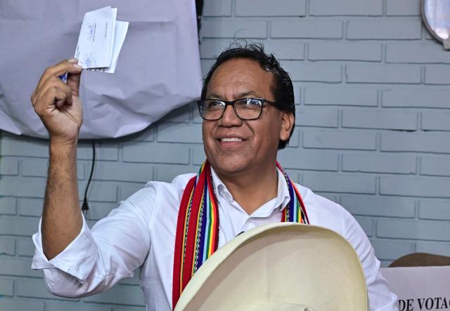 Peru's presidential candidate Roberto Sanchez, for the Juntos por el Peru party, prepares to cast his vote during the general election runoff, in Lima on June 7, 2026. Peruvians will choose their ninth president in 10 years in a tight runoff election between conservative Keiko Fujimori and leftist Roberto Sanchez, who are trying to woo voters fed up with political chaos and rising crime. (Photo by AFP)