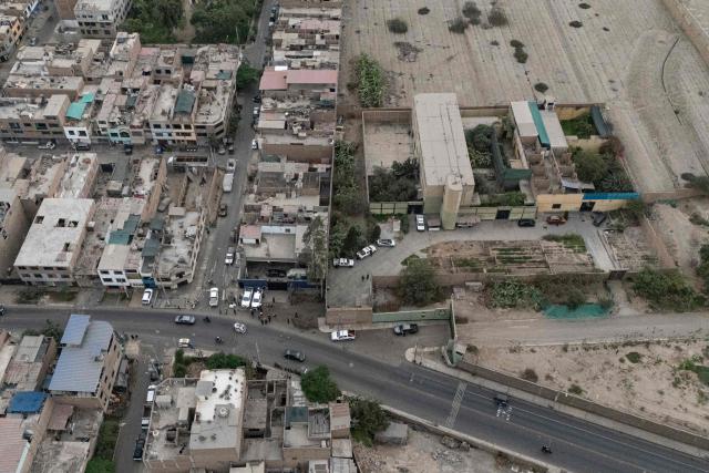 This aerial view shows the Barbadillo prison, where former Peruvian President Pedro Castillo is being held, during the presidential runoff election in Lima on June 7, 2026. Peruvians will choose their ninth president in 10 years, in a tight runoff election between conservative Keiko Fujimori and leftist Roberto Sanchez who are trying to woo voters fed up with political chaos and rising crime. (Photo by Ernesto BENAVIDES / AFP)
