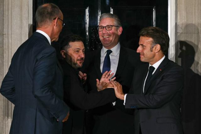 (L to R) Germany's Chancellor Friedrich Merz, Ukraine's President Volodymyr Zelensky, Britain's Prime Minister Keir Starmer and France's President Emmanuel Macron chat on the 10 Downing Street doorstep after a meeting in central London on June 7, 2026. (Photo by Ben STANSALL / POOL / AFP)