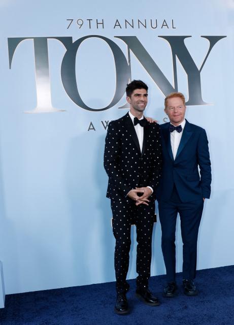 US actor Jesse Tyler Ferguson (R) and his husband Justin Mikita attend the 79th Annual Tony Awards at Radio City Music Hall in New York on June 7, 2026. (Photo by kena betancur / AFP)
