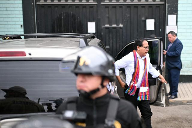 Peruvian presidential candidate Roberto Sanchez arrives at the Barbadillo prison, where former president Pedro Castillo is being held, during the presidential runoff election in Lima on June 7, 2026. Peruvians will choose their ninth president in 10 years, in a tight runoff election between conservative Keiko Fujimori and leftist Roberto Sanchez who are trying to woo voters fed up with political chaos and rising crime. (Photo by ERNESTO BENAVIDES / AFP)