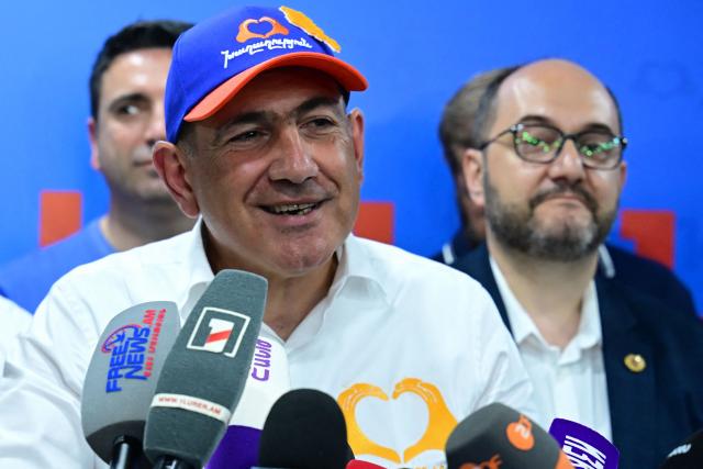 Armenian Prime Minister and leader of the Civil Contract party Nikol Pashinyan holds a press conference following the parliamentary election at the party's headquarters in Yerevan early on June 8, 2026. (Photo by Karen MINASYAN / AFP)