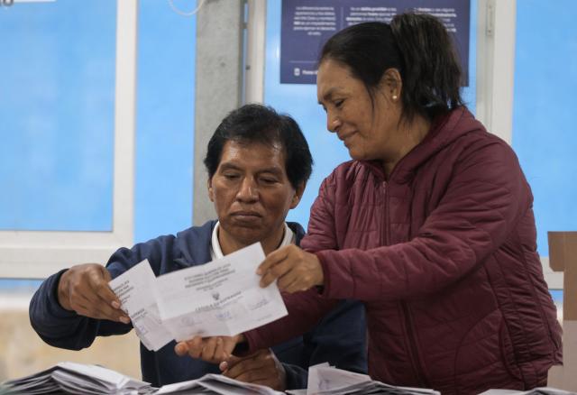 Peruvian election officials count votes during the presidential election runoff at a polling station in San Juan de Lurigancho district, province of Lima, Peru on June 7, 2026. Peruvians will choose their ninth president in 10 years, in a tight runoff election between conservative Keiko Fujimori and leftist Roberto Sanchez who are trying to woo voters fed up with political chaos and rising crime. (Photo by Anthony Nino de Guzman / AFP)