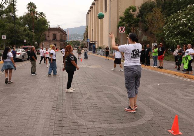Relatives of missing persons from the collective United Forces for the Disappeared of Nuevo Leon, FUNDENL, play football during a protest called 'Wear the shirt for the disappeared' in Monterrey, Nuevo Leon, Mexico on June 6, 2026. (Photo by Julio Cesar AGUILAR / AFP)