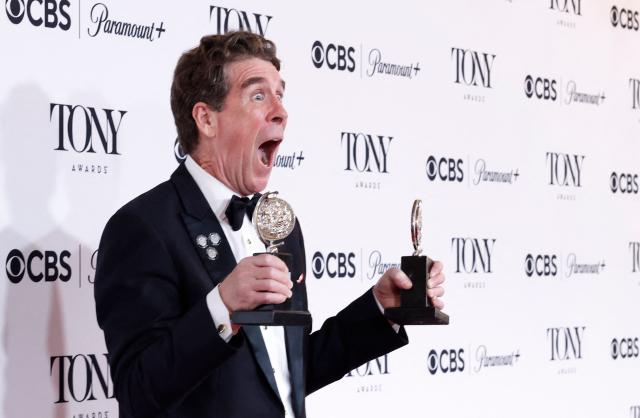 US writer Cinco Paul poses in the press room with the Best Book of a Musical award for "Schmigadoon!" during the 79th Annual Tony Awards at Radio City Music Hall in New York on June 7, 2026. (Photo by kena betancur / AFP)