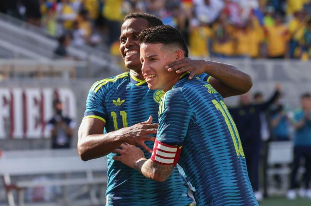 Colombia's midfielder #11 Jhon Arias celebrates with Colombia's midfielder #10 James Rodriguez after scoring a goal during the international friendly football match between Colombia and Jordan at Snapdragon Stadium in San Diego, California, on June 7, 2026. (Photo by SANDY HUFFAKER / AFP)