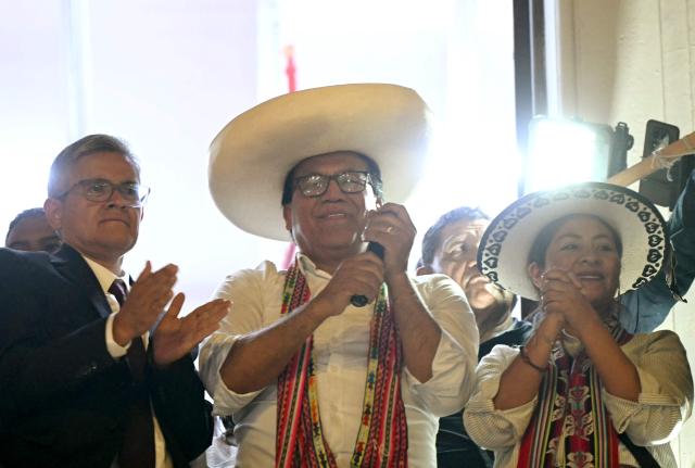 Peru's presidential candidate Roberto Sanchez, for the Juntos por el Peru party, gestures as he gives a speech following the first results of the presidential election runoff in Lima on June 7, 2026. Voting stations closed on June 7, 2026 in Peru's presidential election, with exit polls showing four-time candidate Keiko Fujimori with the slenderest of leads over her leftist rival Roberto Sanchez. (Photo by ERNESTO BENAVIDES / AFP)