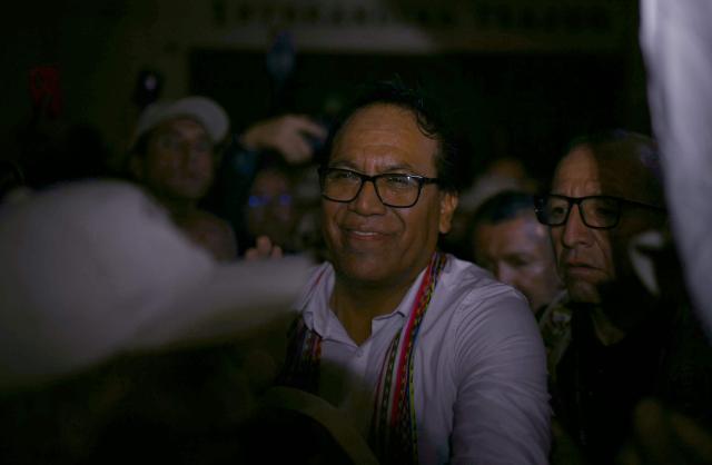 Peru's presidential candidate Roberto Sanchez, for the Juntos por el Peru party, gestures after a speech following the first results of the presidential election runoff in Lima on June 7, 2026. Voting stations closed on June 7, 2026 in Peru's presidential election, with exit polls showing four-time candidate Keiko Fujimori with the slenderest of leads over her leftist rival Roberto Sanchez. (Photo by ERNESTO BENAVIDES / AFP)