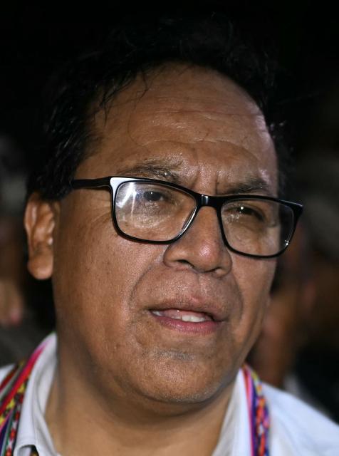 Peru's presidential candidate Roberto Sanchez, for the Juntos por el Peru party, gestures after a speech following the first results of the presidential election runoff in Lima on June 7, 2026. Voting stations closed on June 7, 2026 in Peru's presidential election, with exit polls showing four-time candidate Keiko Fujimori with the slenderest of leads over her leftist rival Roberto Sanchez. (Photo by ERNESTO BENAVIDES / AFP)
