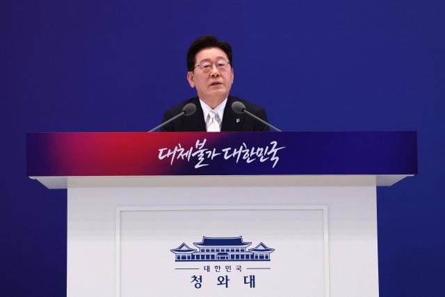 South Korean President Lee Jae Myung attends a press conference to mark the first anniversary of his inauguration at the Blue House in Seoul on June 8, 2026. (Photo by Chung Sung-Jun / POOL / AFP)