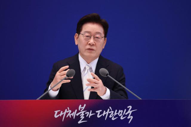 South Korean President Lee Jae Myung attends a press conference to mark the first anniversary of his inauguration at the Blue House in Seoul on June 8, 2026. (Photo by Chung Sung-Jun / POOL / AFP)