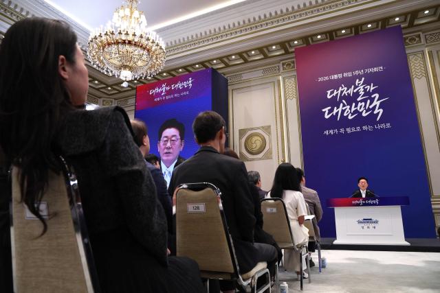 South Korean President Lee Jae Myung attends a press conference to mark the first anniversary of his inauguration at the Blue House in Seoul on June 8, 2026. (Photo by Chung Sung-Jun / POOL / AFP)