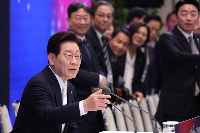 South Korean President Lee Jae Myung attends a press conference to mark the first anniversary of his inauguration at the Blue House in Seoul on June 8, 2026. (Photo by Chung Sung-Jun / POOL / AFP)