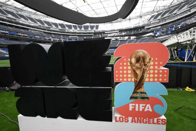 The 2026 FIFA World Cup logo is seen at Los Angeles Stadium (temporarily renamed from SoFi Stadium) ahead of the 2026 FIFA World Cup in Los Angeles on June 7, 2026. (Photo by Patrick T. Fallon / AFP)