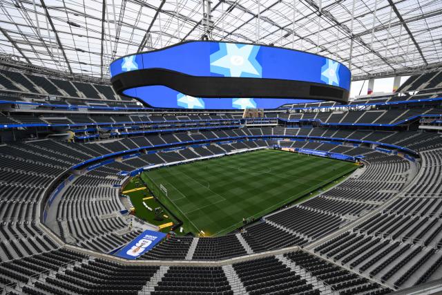 The fully installed grass pitch is seen at Los Angeles Stadium (temporarily renamed from SoFi Stadium) ahead of the 2026 FIFA World Cup in Los Angeles on June 7, 2026. (Photo by Patrick T. Fallon / AFP)