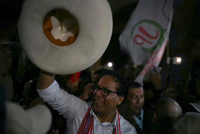 Peru's presidential candidate Roberto Sanchez, for the Juntos por el Peru party, gestures after a speech following the first results of the presidential election runoff in Lima on June 7, 2026. Voting stations closed on June 7, 2026 in Peru's presidential election, with exit polls showing four-time candidate Keiko Fujimori with the slenderest of leads over her leftist rival Roberto Sanchez. (Photo by ERNESTO BENAVIDES / AFP)