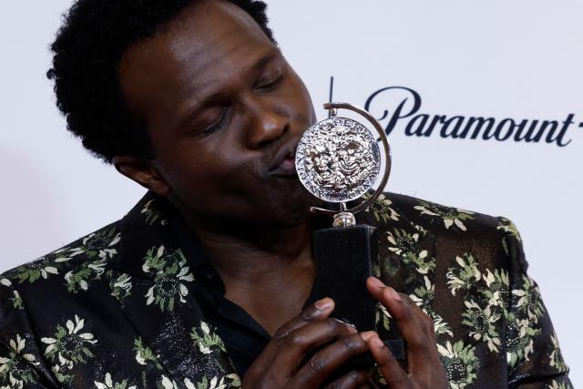US actor Joshua Henry poses with the award for Best Performance by an Actor in a Leading Role in a Musical for "Ragtime" in the press room during the 79th Annual Tony Awards at Radio City Music Hall in New York on June 7, 2026. (Photo by kena betancur / AFP)