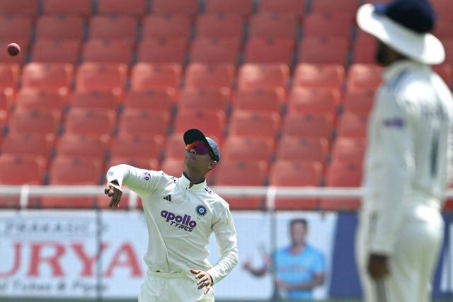 India's Yaishasvi Jaiswal throws the ball during the third day of the only Test cricket match between India and Afghanistan at the Maharaja Yadavindra Singh International Cricket Stadium on the outskirts of Chandigarh on June 8, 2026. (Photo by Shammi MEHRA / AFP)