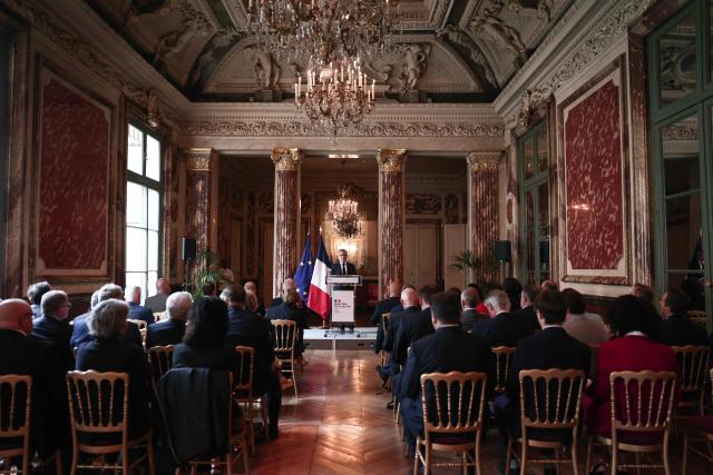 France's Justice Minister Gerald Darmanin (C) addresses prosecutors during a working meeting with France's public prosecutors general to ask them for a review of complaints involving child victims in the wake of the Lyhanna case, while feminist and child protection groups called for demonstrations in front of courthouses at the Ministry of Justice in Paris, on June 8, 2026. Darmanin will tell them that they have until July 14, 2026 “to review all the complaints involving children,” around 70,000 in total, as the minister already announced on June 7, 2026 on LCI. (Photo by Behrouz MEHRI / POOL / AFP)