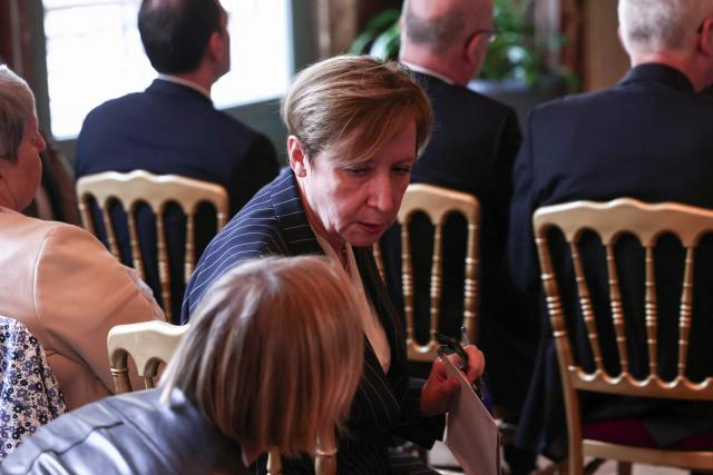 Paris' prosecutor Marie-Suzanne Le Queau (C) waits for the arrival of France's Justice Minister ahead of a working meeting with France's public prosecutors general to ask them for a review of complaints involving child victims in the wake of the Lyhanna case, while feminist and child protection groups called for demonstrations in front of courthouses at the Ministry of Justice in Paris, on June 8, 2026. Darmanin will tell them that they have until July 14, 2026 “to review all the complaints involving children,” around 70,000 in total, as the minister already announced on June 7, 2026 on LCI. (Photo by Behrouz MEHRI / POOL / AFP)