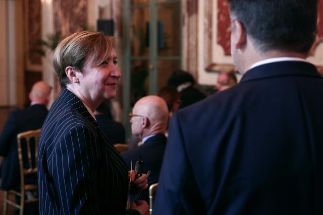 Paris' prosecutor Marie-Suzanne Le Queau (C) waits for the arrival of France's Justice Minister ahead of a working meeting with France's public prosecutors general to ask them for a review of complaints involving child victims in the wake of the Lyhanna case, while feminist and child protection groups called for demonstrations in front of courthouses at the Ministry of Justice in Paris, on June 8, 2026. Darmanin will tell them that they have until July 14, 2026 “to review all the complaints involving children,” around 70,000 in total, as the minister already announced on June 7, 2026 on LCI. (Photo by Behrouz MEHRI / POOL / AFP)