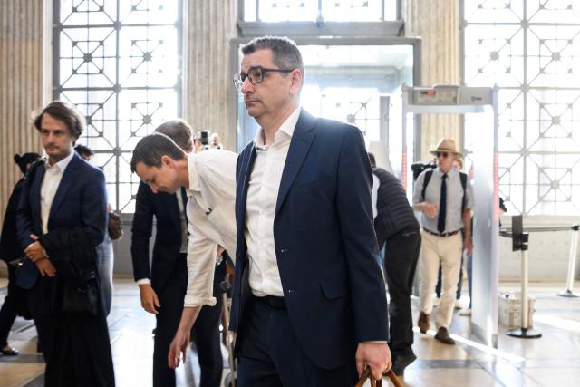 Former mayor of Saint-Etienne Gael Perdriau (C) arrives to attend his appeal trial in the sextape blackmail case at the Lyon Court of Appeal on June 8, 2026. The former mayor of Saint-Étienne, Gaël Perdriau, is retried on appeal starting June 8, 2026, six months after being found "fully guilty" and sentenced to a prison term for blackmail involving a sextape of his first deputy. (Photo by JEFF PACHOUD / AFP)